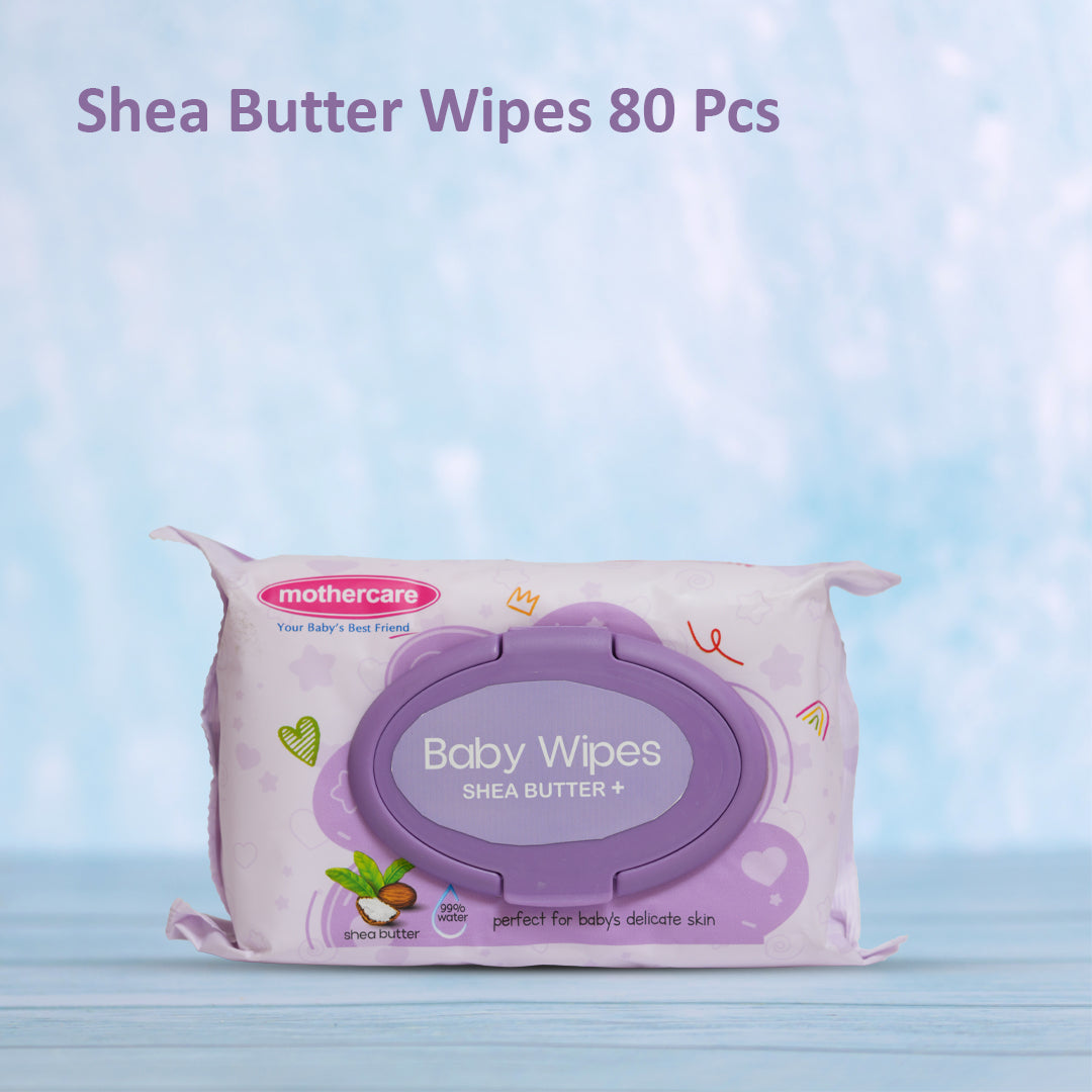Pack of Mothercare baby wipes with shea butter on a light blue background