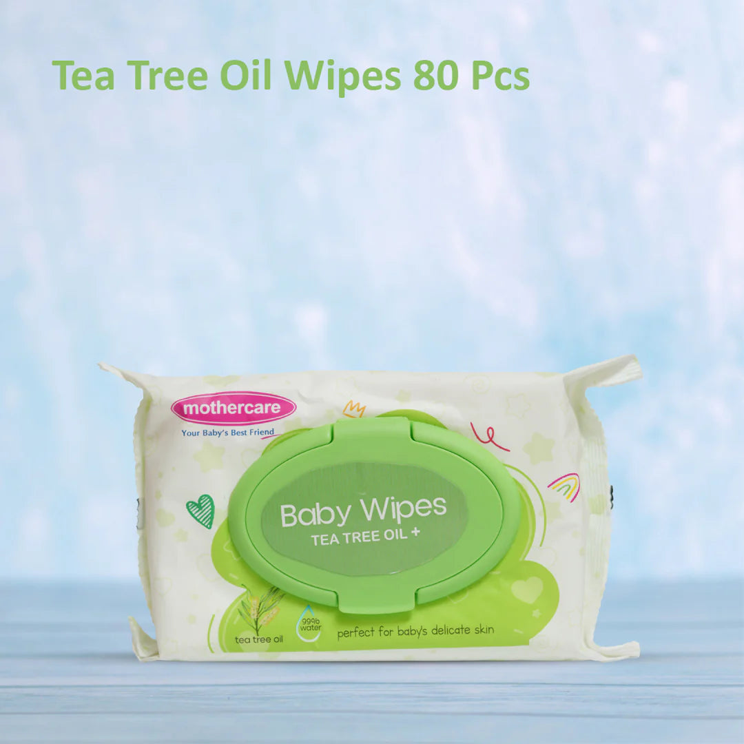 Pack of Mothercare baby wipes with tea tree oil on a light blue background

