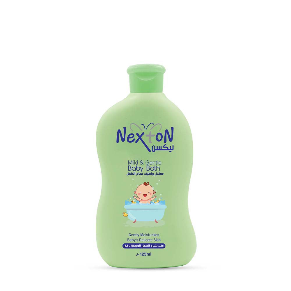 Green bottle of Nexton baby bath on a white background


