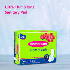 Box of Mothercare sanitary pads with a floral design on a light blue background

